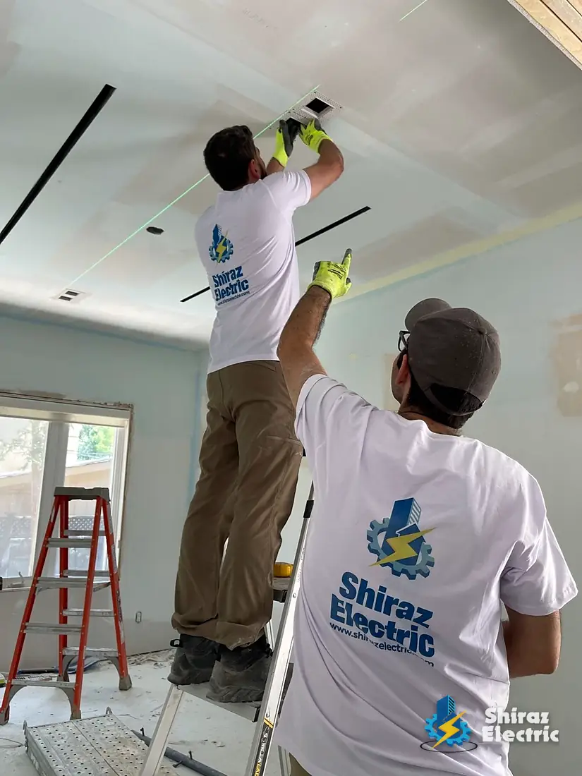 Professional electricians at work